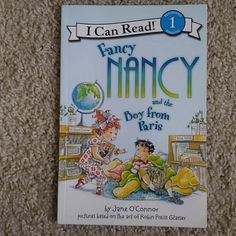 the book i can read fancy and the boy from fars is laying on the floor