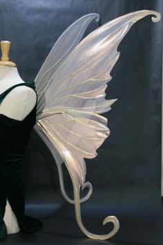 a mannequin dressed as a fairy with wings