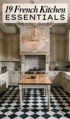 a kitchen with black and white checkered flooring and chandelier above the island