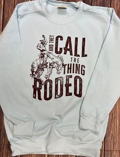 "They Call The Thing Rodeo Sweatshirt | Retro Sublimation | Western Comfort Colors Sweatshirt | Rodeo Sweatshirt | Rodeo Mama This adorable \"They Call The Thing Rodeo\" Sweatshirt is the perfect mix of trendy, Western, and retro vibes. Made on a unisex Comfort Colors sweatshirt. This soft and super comfy sweatshirt is versatile and can be worn all year long. You will surely be the best dressed at the Rodeo! Size up for an oversized fit! Order yours today! :) Please reach out with any questions! Western Cricket Shirts, Western T Shirt Ideas, Western Shirts Vinyl, Western Shirt Ideas, Western Tshirts, Western Hoodies, Western Shirts For Women, Western T Shirts, Western Tshirt