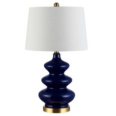 a blue lamp with a white shade on it