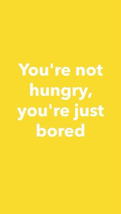 a yellow poster with the words you're not hungry, you're just bored