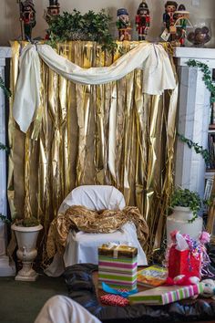 a room decorated with gold foil and presents