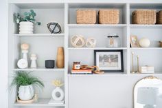 a white shelf filled with lots of different items