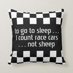 a black and white pillow that says to go to sleep i count race cars not sheep