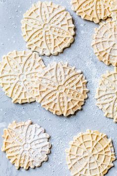 several cookies are arranged on a baking sheet