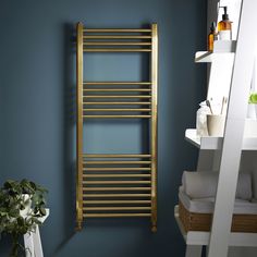 Create a trendy brushed brass accent colour throughout your bathroom when you choose a straight K-Rail towel radiator. This stylish ladder rail benefits from 22mm diameter cross-tubes to ensure excellent heat outputs, keeping your towels warm whilst adding aesthetic appeal to the room. Comes complete with a fixing kit including wall brackets. Towel Racks & Holders, Towel Radiator, Towel Racks, Radiator Valves, Central Heating System, Bathroom Suites, Towel Warmer, Heated Towel Rail, Heated Towel