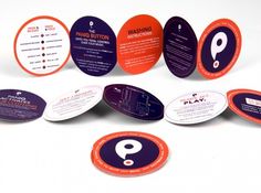 several different types of business cards and magnets