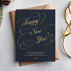 a black and gold new year's card with the words happy new year on it