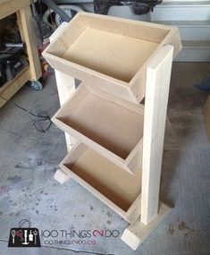 an unfinished wooden shelf is shown in the process of being built