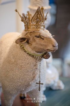 a sheep with a crown on it's head