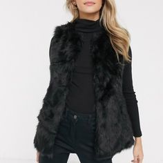 Plush & Fierce!! This Ultra-Plush Faux Fur Vest Is The Ultimate Cold-Weather Outerwear Accessory For This Fall/Winter Season The Vest Is Fully Lined And Has An Open Front. Sold Out!! Size: Xs, But May Fit A Small Content: Shell; Lining: Polyester Retail Price: $148 Smoke-Free Home No Damages Will Ship Same/Next Chic Outerwear With Faux Fur Lining For Night Out, Chic Faux Fur Outerwear For Work, Chic Faux Fur Outerwear For Night Out, Winter Faux Fur Outerwear For Night Out, Spring Outerwear With Faux Fur Trim For Night Out, Black Faux Fur Outerwear For Work, Chic Black Outerwear With Faux Fur Lining, Fall Faux Fur Outerwear For Night Out, Faux Fur Outerwear For Night Out In Fall