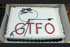 a cake with the word gtfo on it and a drawing of a man holding a knife