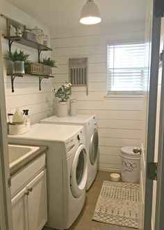 a washer and dryer in a small room