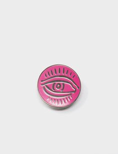 a pink pin with an eye in the center on a white background, it looks like there is no image to describe