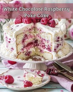 a white chocolate raspberry poke cake on a plate with a slice cut out