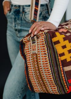 Brown with red, tan, mustard and pink Aztec inspired duffel Zipper closure with interior zipper pocket and 2 small open pockets Removable strap Measures 20" x 11" x 8" 100% Cotton Lining: 100% Polyester Pendleton Cosmetics Bag, Multicolor Travel Duffle Bag With Zipper Closure, Multicolor Travel Bag With Zipper For Weekend Trips, Multicolor Weekender Bag With Zipper For Daily Use, Multicolor Rectangular Weekender Bag With Zipper, Casual Brown Weekender Bag With Zipper Closure, Multicolor Weekender Bag With Adjustable Strap, Bohemian Multicolor Duffle Bag For Everyday Use, Multicolor Tote Duffle Bag For On-the-go