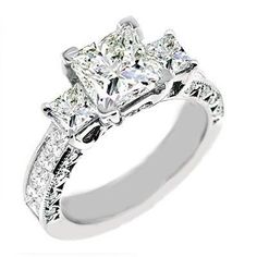 a princess cut diamond engagement ring with side stones