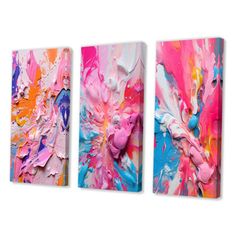 three abstract paintings with different colors and shapes on canvases, one is pink, the other is blue