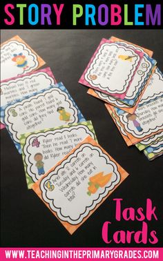 four children's prayer cards on a table