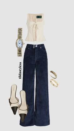 a woman is wearing high waisted jeans and white shirt with heels, watch, bracelets and jewelry