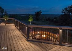 a deck lit up with lights at night