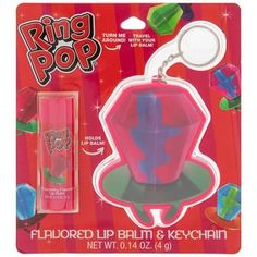 the ring pop keychain is pink and has blue, purple, and green shapes