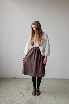 Below the knee skirt is made from 100% soft and washed linen. This Petticoat is perfect for wearing under dress or other skirt or can be worn alone. Match it with our tunics! Details: - Composition: 100% Oeko-Tex certified linen - Colour: chocolate brown - Elastic waist - Pockets - Size: One size/fits all - Medium weight linen - Linen care: machine wash gentle; tumble dry low, ironing optional - The price is for one skirt, other pictured items are not included Beginner Skirt, Linen Skirt Midi, Long Linen Skirt, Linen Midi Skirt, Below The Knee Skirt, Skirt Inspiration, Skirt Linen, Knee Skirt, Knee Skirts