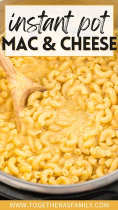 instant pot macaroni and cheese is being stirred with a wooden spoon in it