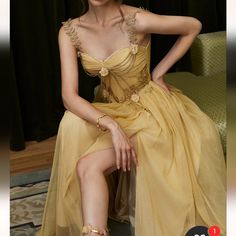 Questions? Leave A Comment Below! Old New York Prom Dresses, Gold And Black Dress Prom, Neutral Color Prom Dresses, Masquerade Theme Dresses, Gold New Years Dress, Maximalist Prom Dress, High Femme Outfits, Beauty And The Beast Inspired Dress, Prom Masquerade Theme Dress