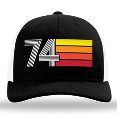 a black and white trucker hat with the number 47 on it's front