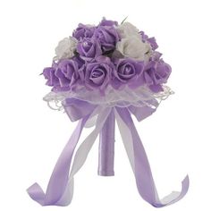 a bouquet of purple and white roses