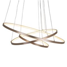 a modern chandelier hanging from the ceiling, with three circular lights suspended above it