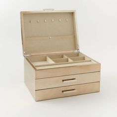 an empty wooden box with three compartments on the bottom and two drawers in the middle