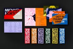 the brochures are laid out on top of each other, with different colors