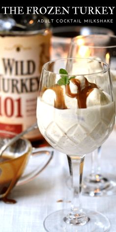 two wine glasses filled with ice cream and caramel