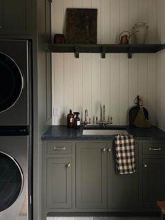 the kitchen is clean and ready to be used as a washer and dryer