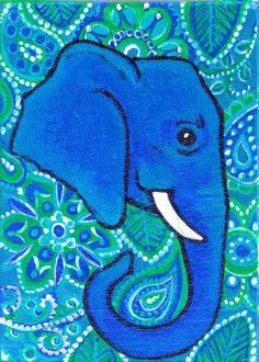 an elephant painted in blue and green colors