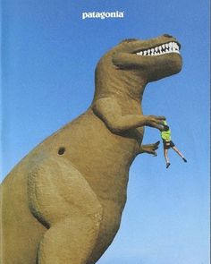 an image of a dinosaur with a man on it's back in the air