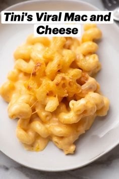 a white plate topped with macaroni and cheese