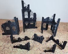 several pieces of gothic architecture sitting on a table