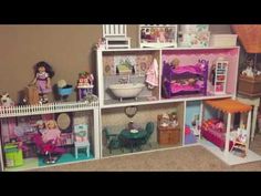 a doll house with lots of furniture and accessories