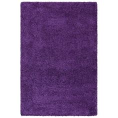 a purple rug on a white background with no one in the room to see it