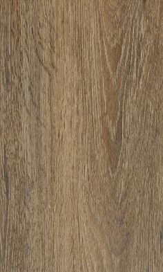 a close up view of the wood grains on an oak flooring paneled in brown