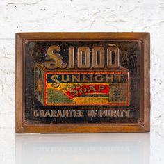 an old fashioned soap sign hanging on the wall