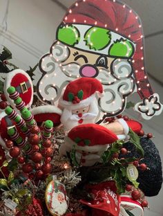 an assortment of christmas decorations on display