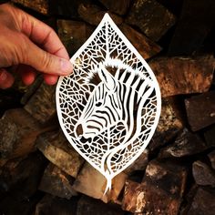 My papercut Zebra leaf is cut from one sheet of acid free cream hammered paper with love and a blade! All my papercuts are one offs, so therefore unique, and make a wonderful original gifts. This is an unframed listing.  Your papercut will be shipped in a protective cellophane sleeve in a sturdy cardboard envelope to ensure it arrives to you in perfect condition. It is also possible to make designs to order, so feel free to contact me with your idea. Zebra Tattoo, Zebra Tattoos, Bee Coloring Pages, Papercut Art, Paper Art Sculpture, Paper Box Template, Paper Carving, Paper Cutout Art, 3d Printing Diy