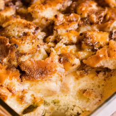 a close up view of a casserole dish with cheese and meat toppings