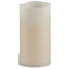 a large white candle on a white background