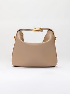 Introducing our slouchy top handle bag - the epitome of luxury and versatility. This bag features a sleek and slouchy design with a convenient detachable crossbody strap, allowing you to effortlessly switch from day to night. Elevate your style and functionality with this must-have accessory. Composition: 100% Leather Made in Italy. Slouchy Top, Handbag Essentials, Beige Bag, Classic Handbags, Luxury Designer Handbags, Essential Bag, Cute Bags, Bags Designer Fashion